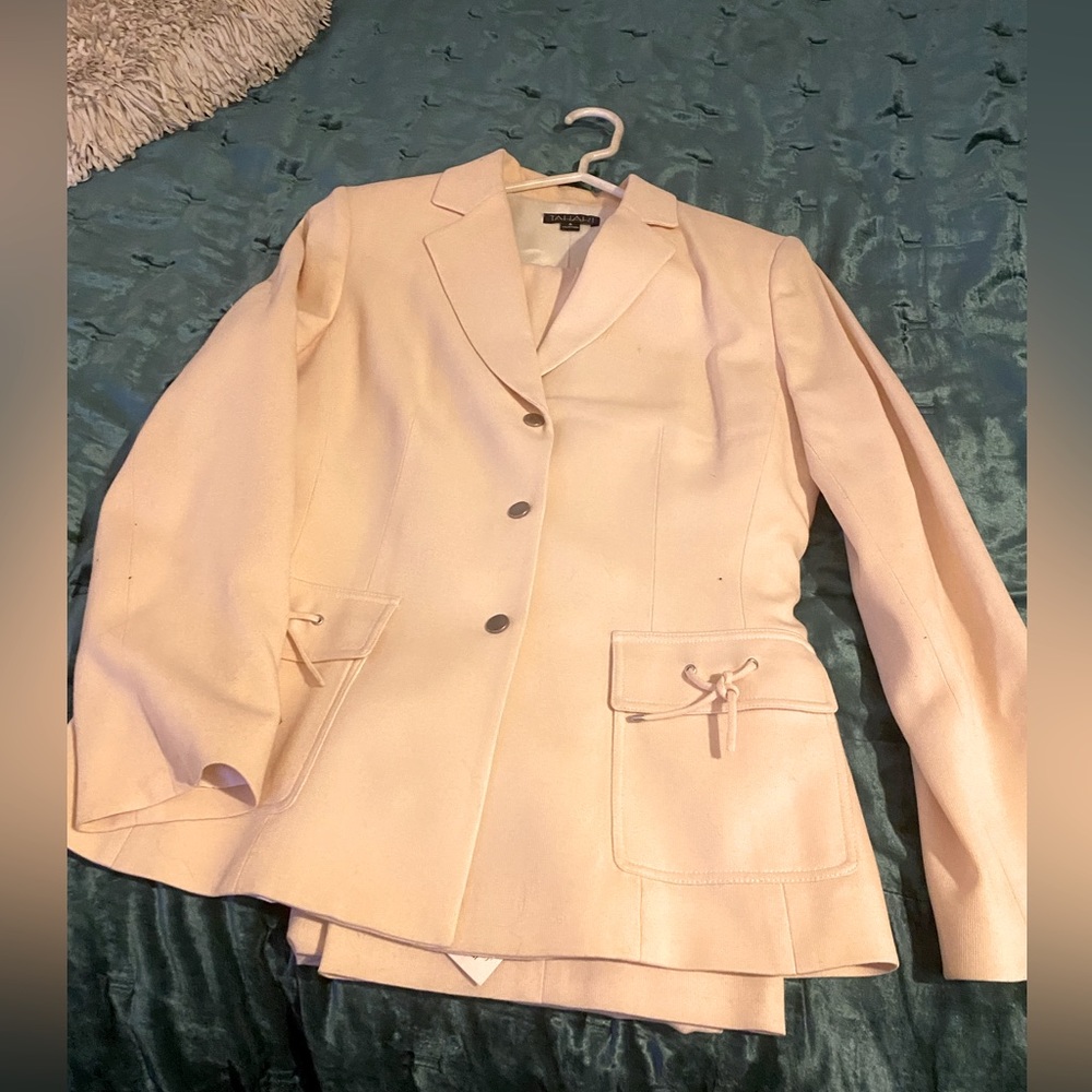 Two piece pants suit.